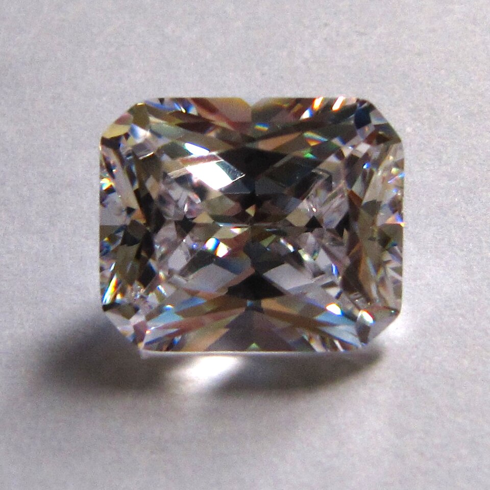 A rectangular diamond with cut corners.