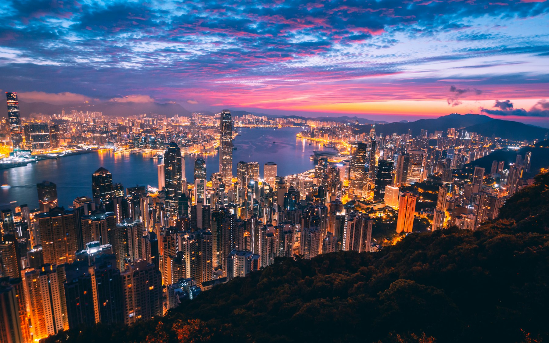Hong Kong harbour at dusk.